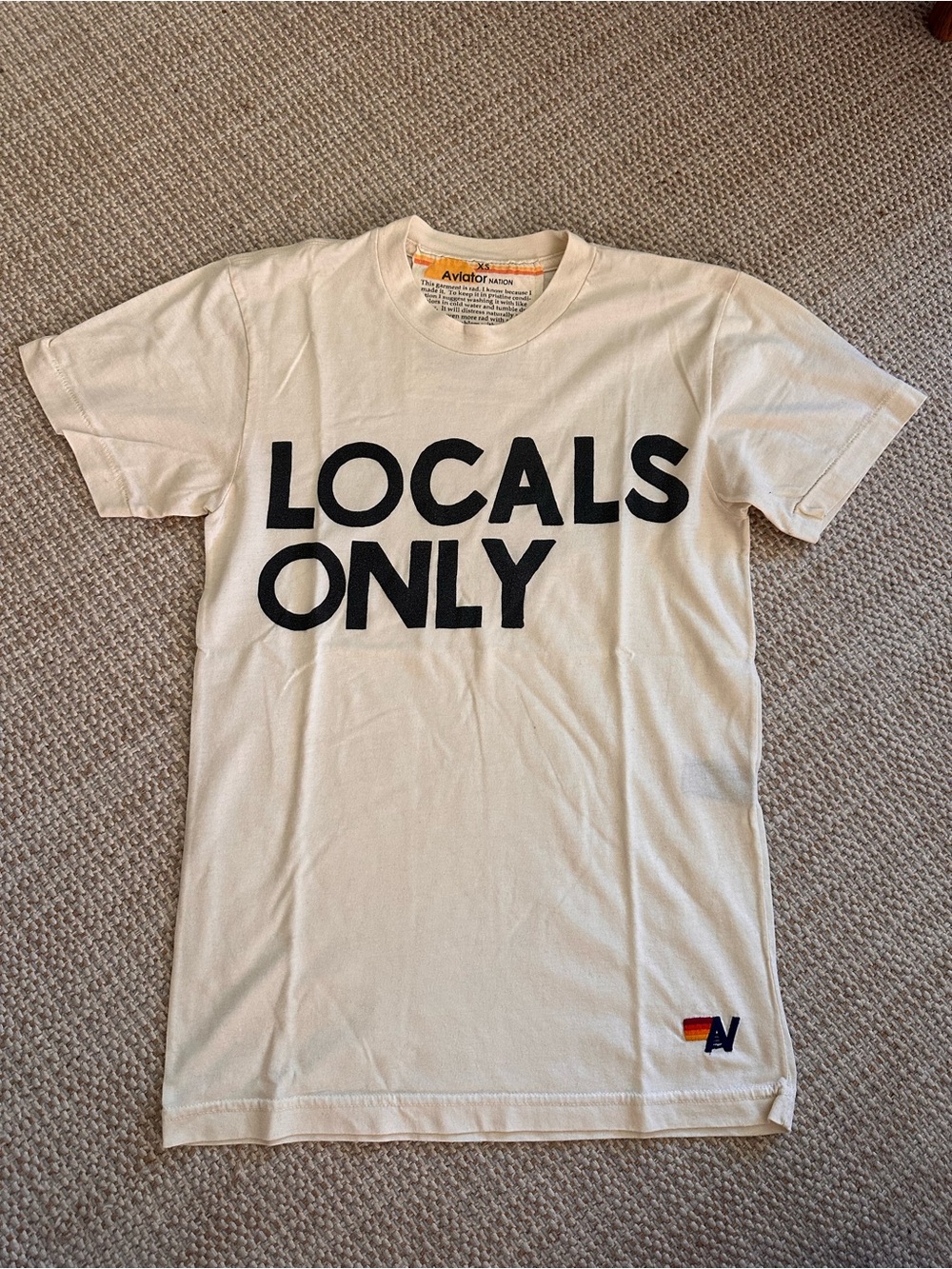Aviator Nation cream t-shirt with black text reading 'LOCALS ONLY' XS